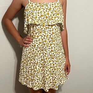 Fresh white dress with yellow flowers, comfortable, for summer.